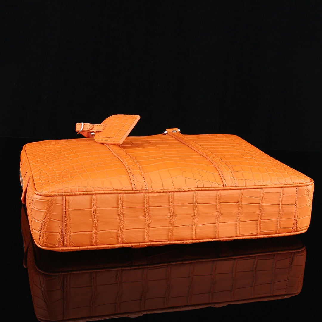 The BELTLEY Catalyst Briefcase in Vibrant Orange Crocodile