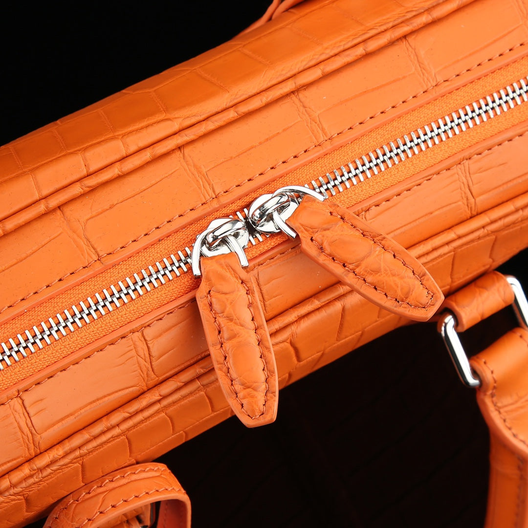 The BELTLEY Catalyst Briefcase in Vibrant Orange Crocodile