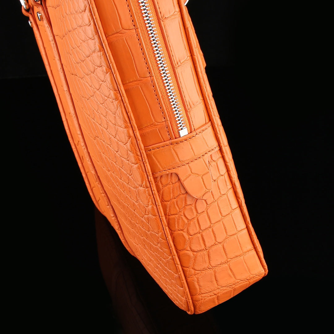 The BELTLEY Catalyst Briefcase in Vibrant Orange Crocodile