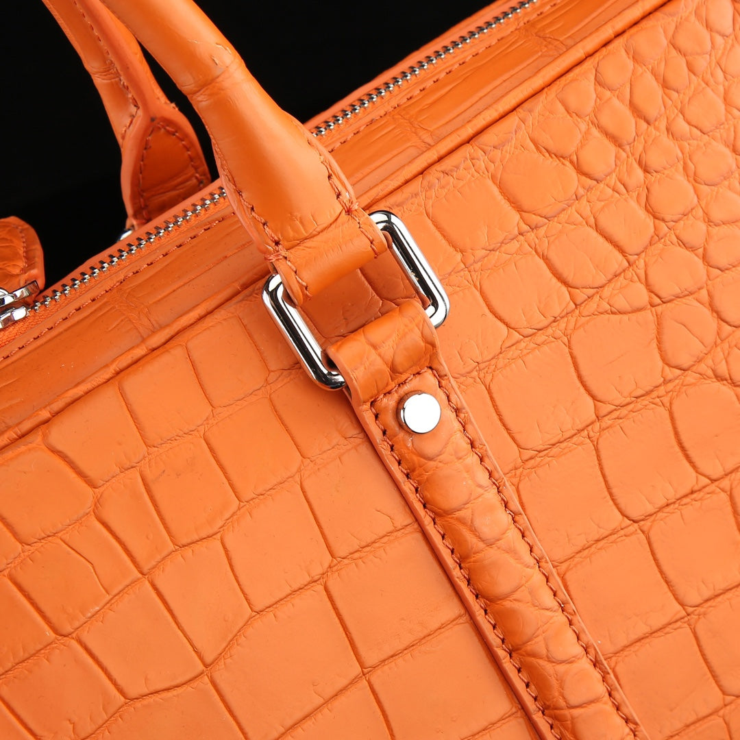 The BELTLEY Catalyst Briefcase in Vibrant Orange Crocodile