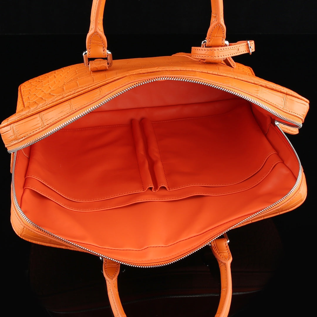 The BELTLEY Catalyst Briefcase in Vibrant Orange Crocodile